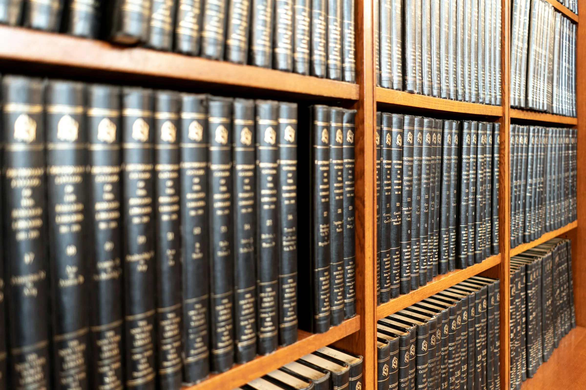 Shelves of bound legal volumes in a law library