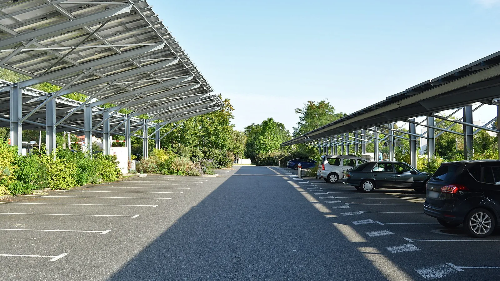 The car park of the Bellerive-sur-Allier aquatic centre covered with photovoltaic canopies, in summer