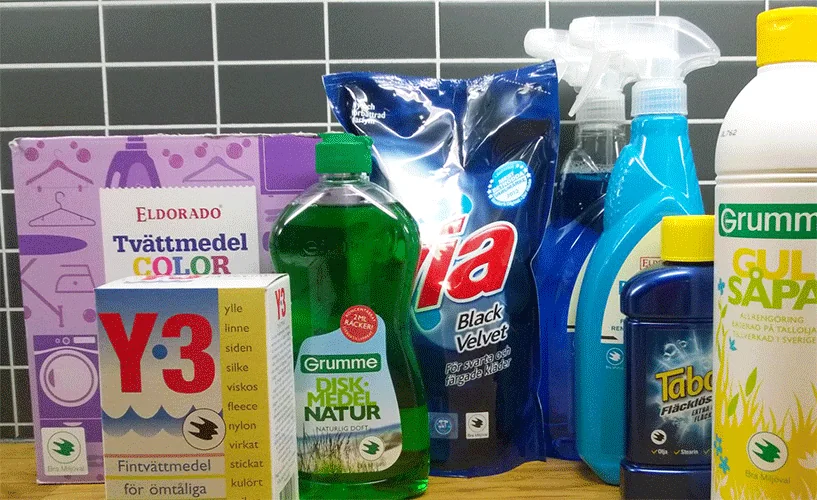 Laundry detergent, washing-up liquid, sprays and soap from several Swedish brands, side by side, all bearing the falcon logo of the Bra Miljöval label