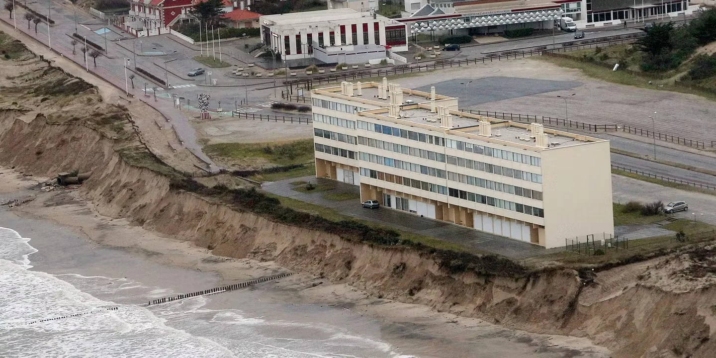 The Le Signal apartment building at Soulac-sur-Mer, on the edge of the sandy cliff eaten away by erosion